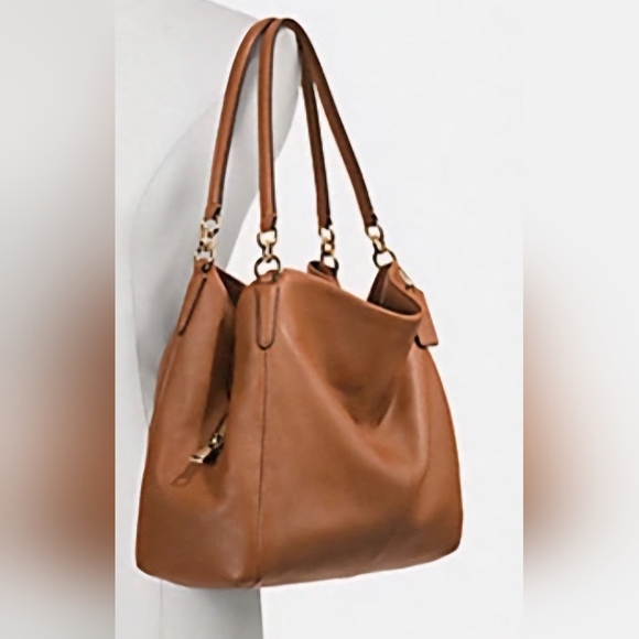 Coach Handbags - Coach New York Brown  pebbled leather slouch handbag See Photos